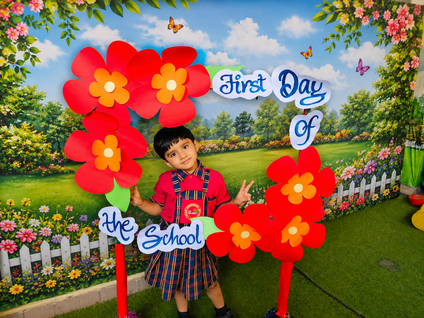 Two students posing in a welcome back to school photo frame